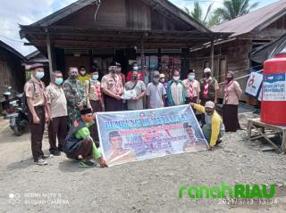  100 Paket Bantuan Pramuka Pekanbaru di Terima langsung Korban Banjir Kalsel